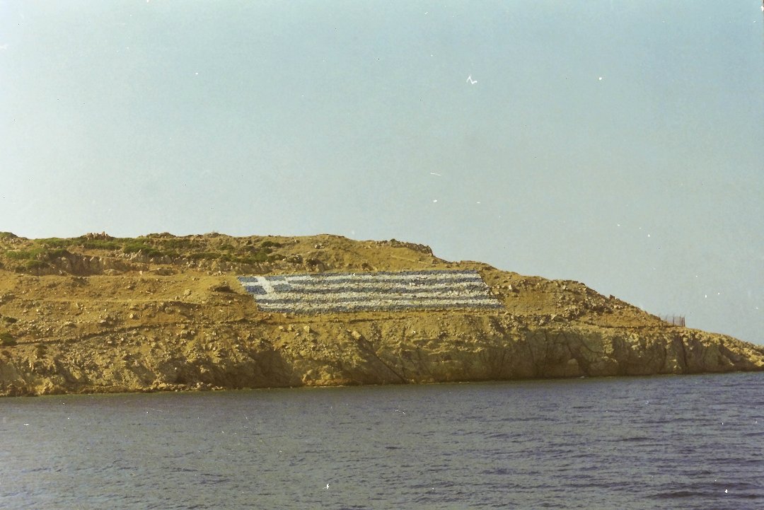 Kalymnos, Grekland - juli 1999 flagga